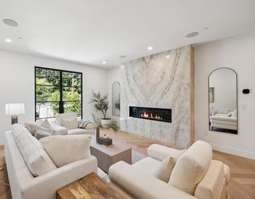 Fireplace, Interior, Living room, Marble Walls, Recessed Lighting, Wood Texture Flooring