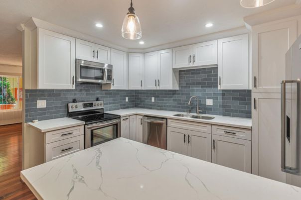 Interior, Kitchen, Pendant Lights, Recessed Lighting, Stainless Steel Appliances, Wood Texture Flooring