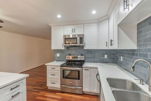 Interior, Kitchen, Recessed Lighting, Stainless Steel Appliances, Wood Texture Flooring