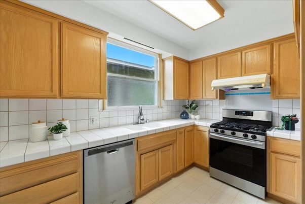 Interior, Kitchen, Stainless Steel Appliances, Tile Countertops