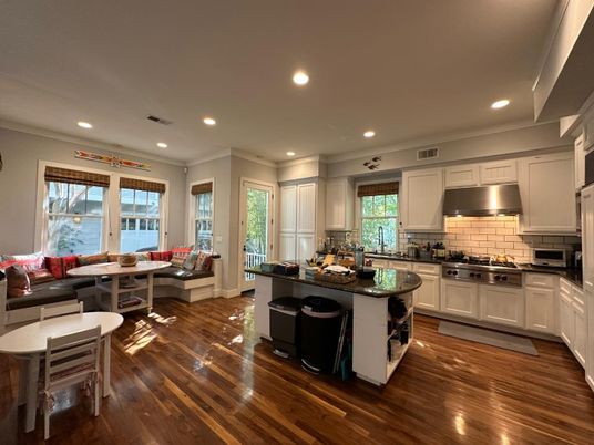 Dining room, Interior, Kitchen, Living room, Recessed Lighting, Stainless Steel Appliances, Water, Wood Texture Flooring