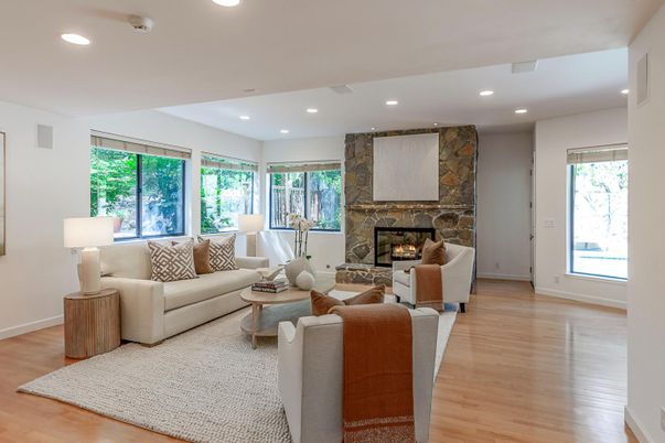 Fireplace, Interior, Living room, Recessed Lighting, Stone Walls, Wood Texture Flooring