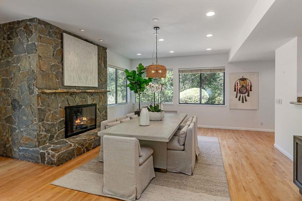 Dining room, Fireplace, Interior, Pendant Lights, Recessed Lighting, Stone Walls, Wood Texture Flooring