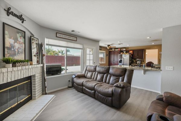 Fireplace, Interior, Kitchen, Living room, Recessed Lighting, Wood Texture Flooring