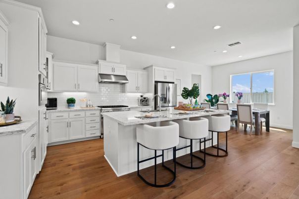 Dining room, Interior, Kitchen, Recessed Lighting, Stainless Steel Appliances, Wood Texture Flooring