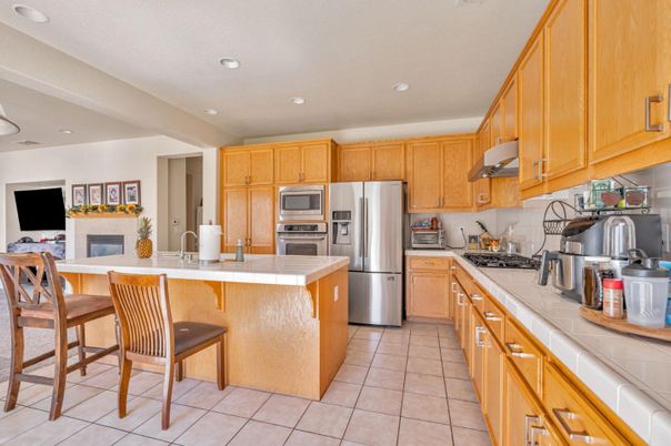 Interior, Kitchen, Recessed Lighting, Stainless Steel Appliances, Tile Countertops