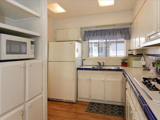 Interior, Kitchen, Tile Countertops, Wood Texture Flooring