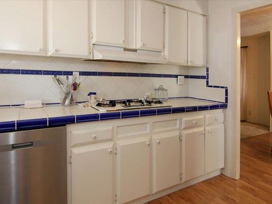 Interior, Kitchen, Tile Countertops, Wood Texture Flooring