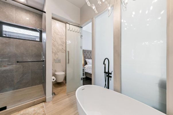 Bathroom, Bedroom, Free Standing Baths, Glass Shower, Interior, Marble Walls, Wood Texture Flooring