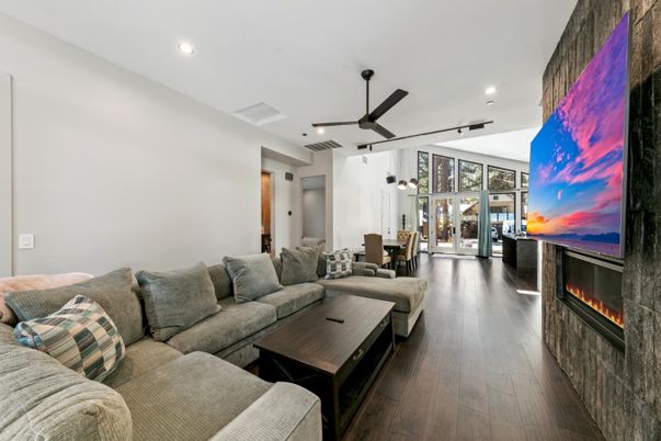 Dining room, Fireplace, Interior, Living room, Recessed Lighting, Wood Texture Flooring
