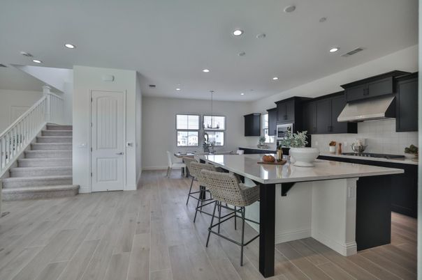 Dining room, Interior, Kitchen, Pendant Lights, Recessed Lighting, Stainless Steel Appliances, Wood Texture Flooring
