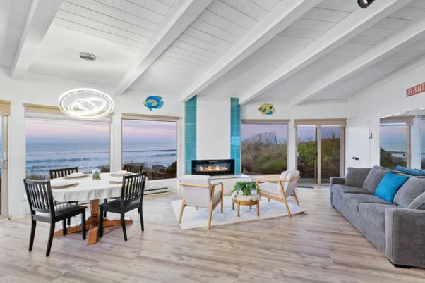 Dining room, Fireplace, Interior, Living room, Pendant Lights, Water, Wood Texture Flooring