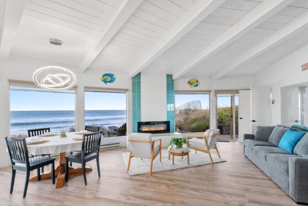 Dining room, Fireplace, Interior, Living room, Pendant Lights, Water, Wood Texture Flooring