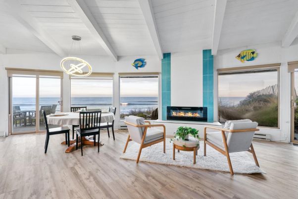 Dining room, Fireplace, Interior, Living room, Pendant Lights, Water, Wood Texture Flooring