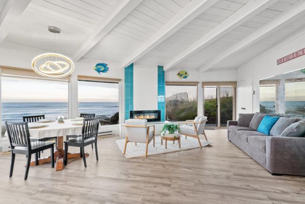 Dining room, Fireplace, Interior, Living room, Pendant Lights, Water, Wood Texture Flooring