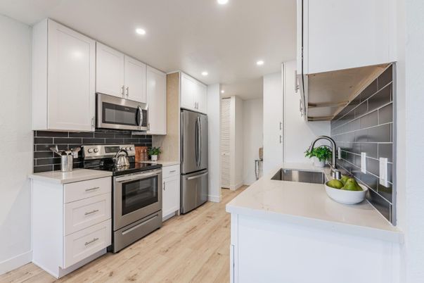 Interior, Kitchen, Recessed Lighting, Stainless Steel Appliances, Wood Texture Flooring