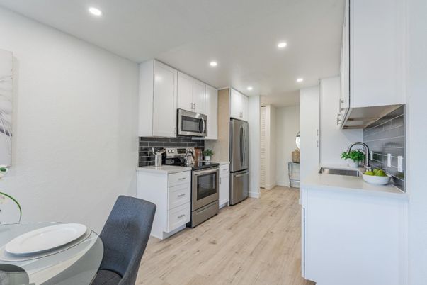 Interior, Kitchen, Recessed Lighting, Stainless Steel Appliances, Wood Texture Flooring