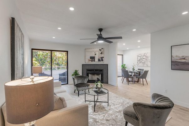 Dining room, Fireplace, Interior, Living room, Recessed Lighting, Wood Texture Flooring