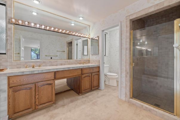 Bathroom, Dual Sink Vanities, Glass Shower, Interior, Recessed Lighting, Tile Countertops