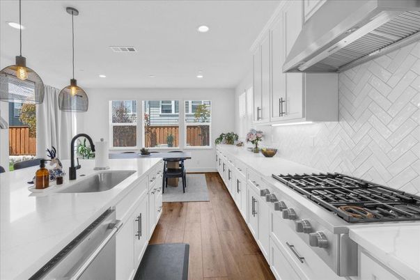 Dining room, Interior, Kitchen, Pendant Lights, Recessed Lighting, Stainless Steel Appliances, Wood Texture Flooring