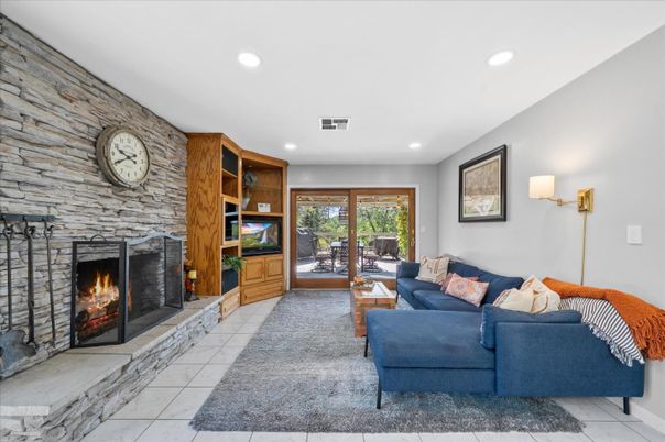 Fireplace, Interior, Living room, Marble, Recessed Lighting, Stone Walls