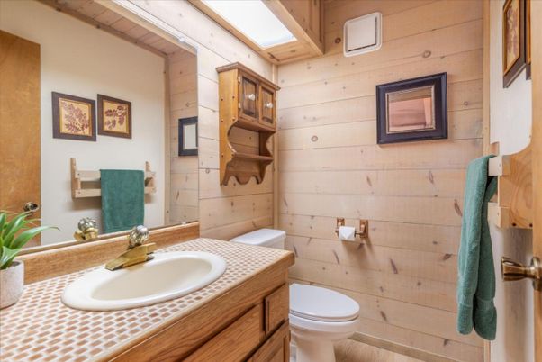 Bathroom, Interior, Tile Countertops, Wood Texture Flooring, Wooden Walls