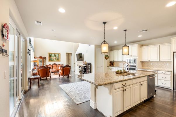 Dining room, Interior, Kitchen, Living room, Pendant Lights, Recessed Lighting, Stainless Steel Appliances, Wood Texture Flooring