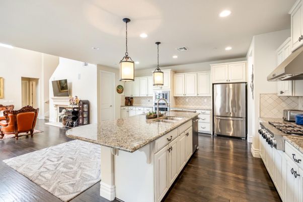 Fireplace, Interior, Kitchen, Pendant Lights, Recessed Lighting, Stainless Steel Appliances, Wood Texture Flooring