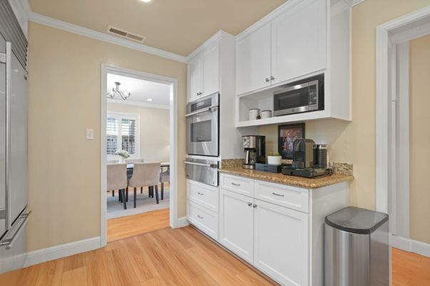 Dining room, Interior, Kitchen, Recessed Lighting, Stainless Steel Appliances, Wood Texture Flooring