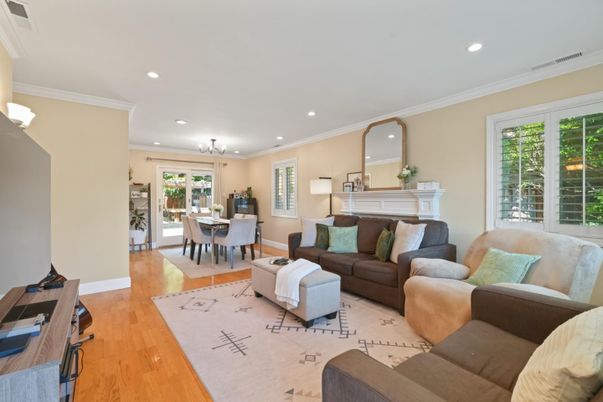 Dining room, Fireplace, Interior, Living room, Recessed Lighting, Wood Texture Flooring