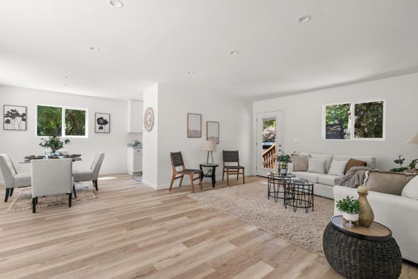 Dining room, Fireplace, Interior, Living room, Recessed Lighting, Wood Texture Flooring
