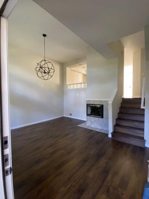 Empty room, Fireplace, Interior, Pendant Lights, Wood Texture Flooring