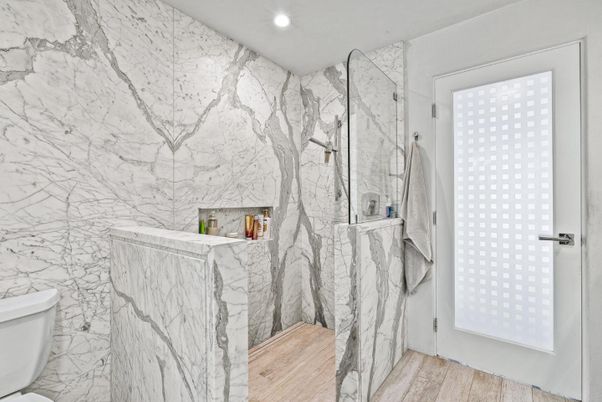 Bathroom, Interior, Marble Walls, Recessed Lighting, Wood Texture Flooring