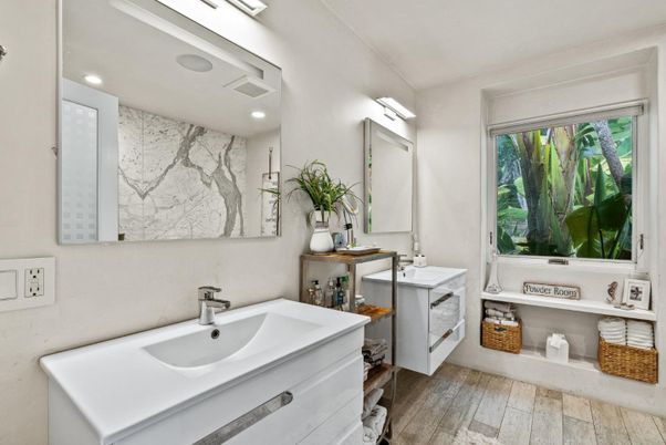 Bathroom, Dual Sink Vanities, Interior, Marble Walls, Recessed Lighting, Wood Texture Flooring
