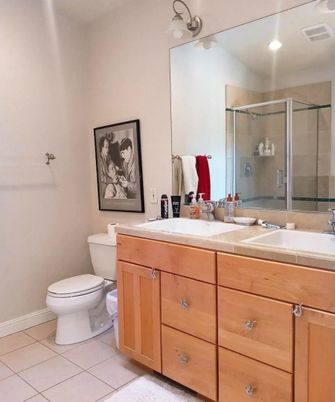 Bathroom, Dual Sink Vanities, Glass Shower, Interior, Recessed Lighting, Tile Countertops
