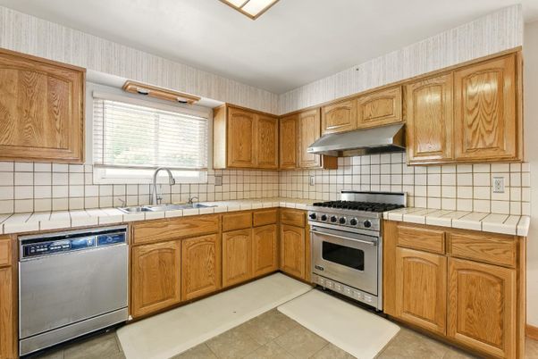 Interior, Kitchen, Stainless Steel Appliances, Tile Countertops