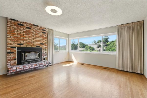 Empty room, Fireplace, Interior, Recessed Lighting, Stone Walls, Wood Texture Flooring