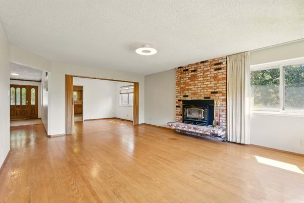 Empty room, Fireplace, Interior, Recessed Lighting, Stone Walls, Wood Texture Flooring