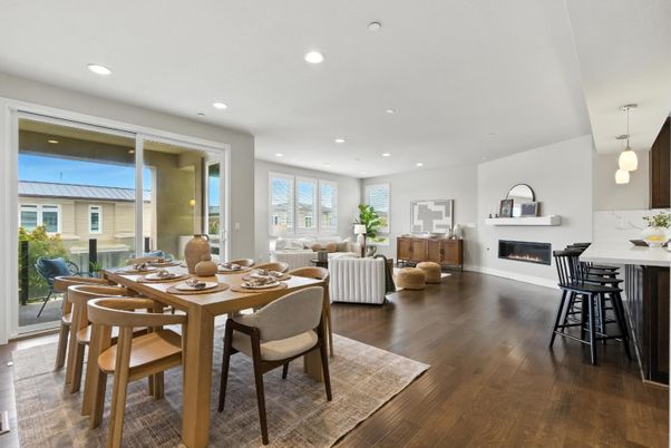 Dining room, Fireplace, Interior, Living room, Pendant Lights, Recessed Lighting, Wood Texture Flooring