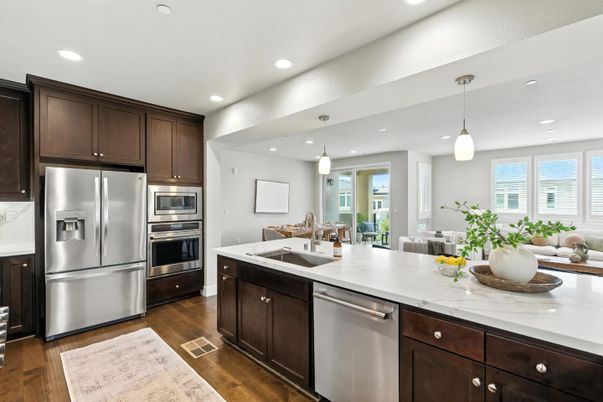 Dining room, Interior, Kitchen, Pendant Lights, Recessed Lighting, Stainless Steel Appliances, Wood Texture Flooring