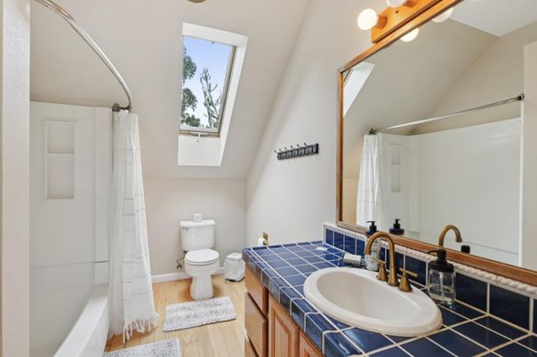 Bathroom, Dual Sink Vanities, Interior, Tile Countertops, Wood Texture Flooring