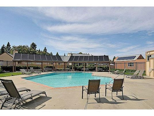 Exterior, Pool, Solar Panels