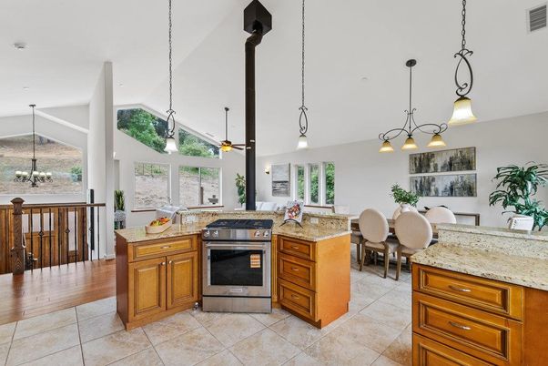 Dining room, Interior, Kitchen, Pendant Lights, Stainless Steel Appliances, Wood Texture Flooring