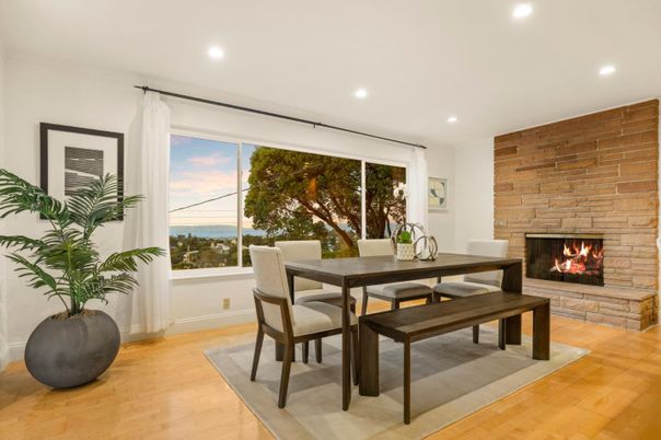 Dining room, Fireplace, Interior, Recessed Lighting, Stone Walls, Water, Wood Texture Flooring
