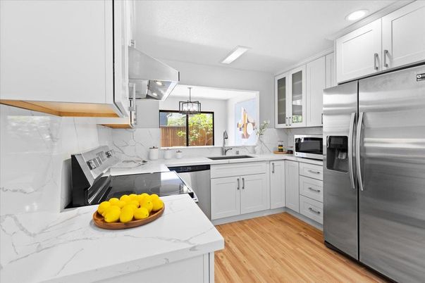 Interior, Kitchen, Pendant Lights, Recessed Lighting, Stainless Steel Appliances, Wood Texture Flooring