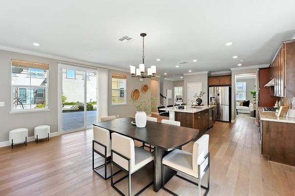 Chandelier, Dining room, Interior, Kitchen, Pendant Lights, Recessed Lighting, Stainless Steel Appliances, Wood Texture Flooring