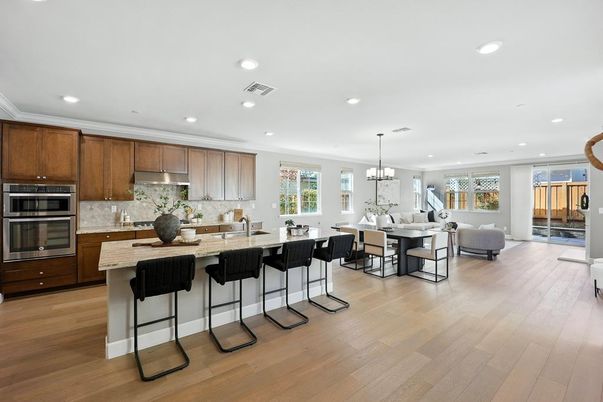 Chandelier, Dining room, Interior, Kitchen, Living room, Recessed Lighting, Stainless Steel Appliances, Wood Texture Flooring