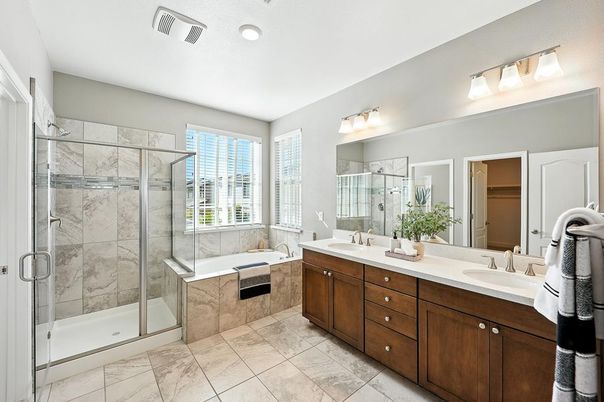 Bathroom, Dual Sink Vanities, Glass Shower, Interior, Marble Walls, Recessed Lighting