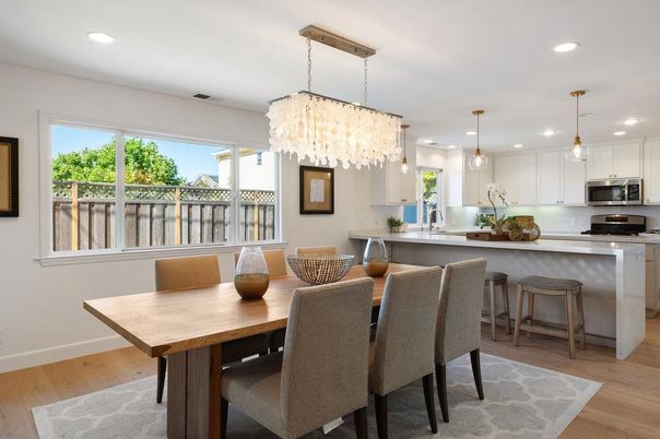 Chandelier, Dining room, Interior, Kitchen, Pendant Lights, Recessed Lighting, Stainless Steel Appliances, Wood Texture Flooring