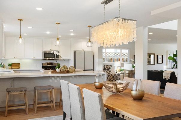 Chandelier, Dining room, Interior, Kitchen, Living room, Pendant Lights, Recessed Lighting, Stainless Steel Appliances, Wood Texture Flooring